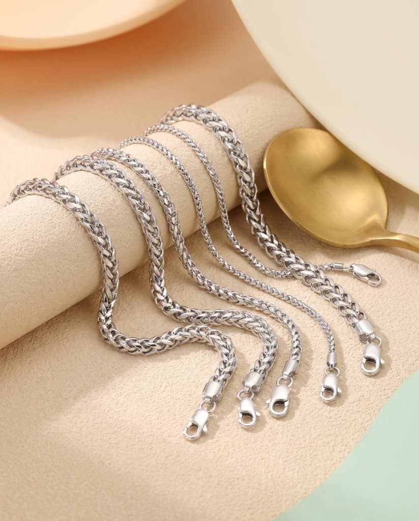 Solid 14K white gold Franco chain, editorial stack. Jade Gold NYC.